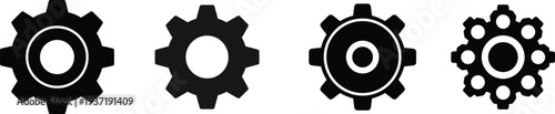 Four black gear icons on a white background