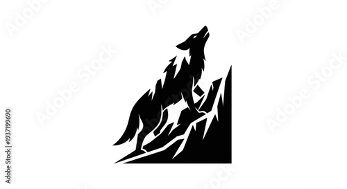 Silhouette of a howling wolf on a mountain