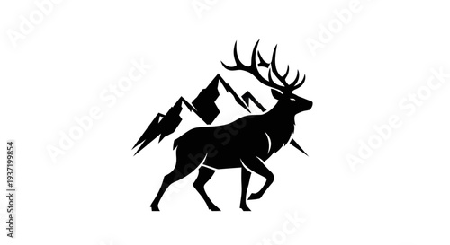 Silhouette of a majestic elk and mountain range