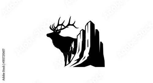 Silhouette of elk and mountain peaks