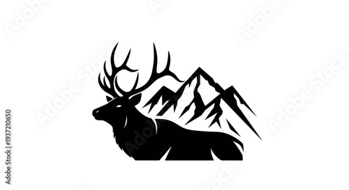 Silhouette of elk and mountain peaks