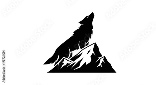 Silhouette of howling wolf on mountain