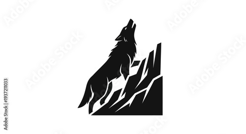 Silhouette of howling wolf on rocks