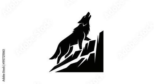 Silhouette of howling wolf on rocks