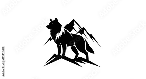 Silhouette of wolf and mountain peaks