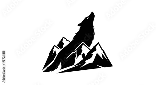 Silhouette of wolf howling over mountains