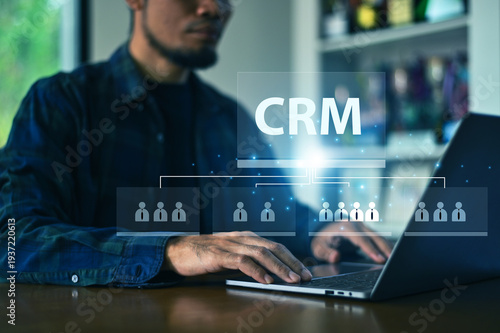 Businessman Analyzing CRM Data with AI Technology for Smart Business Strategy