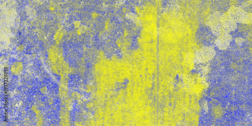 Vibrant abstract grunge texture with bold yellow and blue paint splatters and distressed concrete wall effect