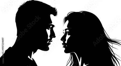 Silhouette of a man and woman facing each other in intimate moment.