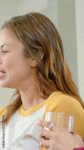 Vertical video: Sunrise casting glow, Pyramids and Sphinx basking on Giza plateau, stelae visible