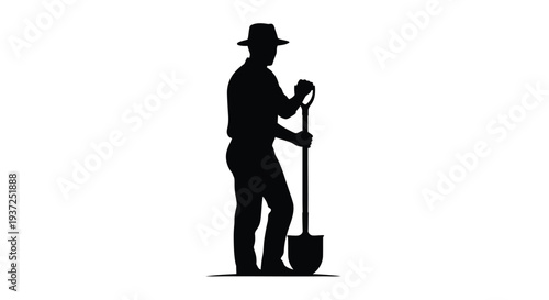 Farmer with shovel depicted in a striking black silhouette