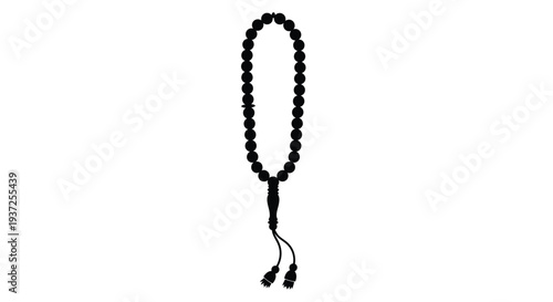 Black prayer beads hanging a striking dark form silhouette