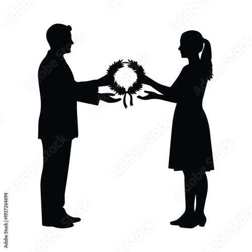 Man and woman exchanging a wreath in a symbolic gesture