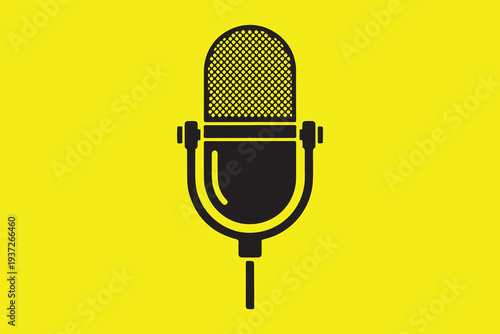 Vintage microphone on yellow background for audio recording or music concept