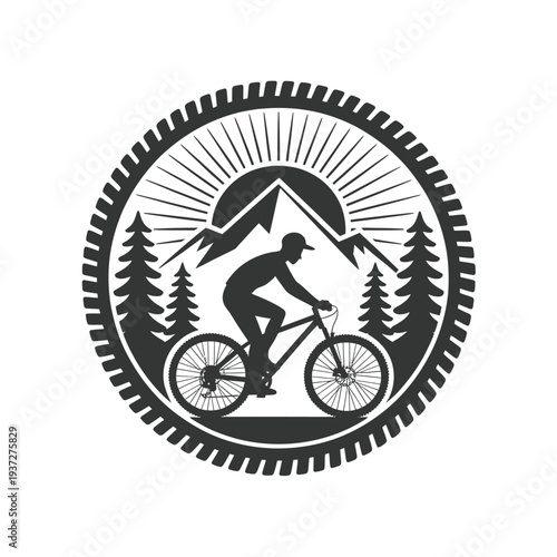 Mountain biker silhouette within a circular sunburst style badge design