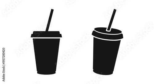 Two black beverage containers with straws a striking silhouette