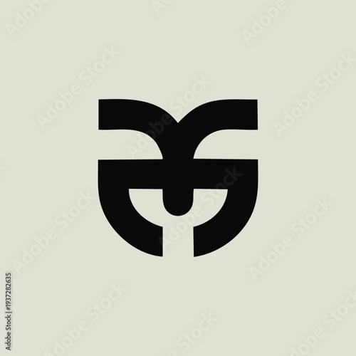 Abstract black symbol resembling a stylized face or mask