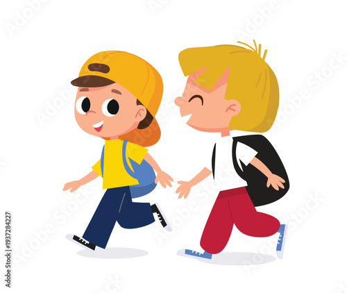 Two little boys, friends, classmates are walking to elementary school. White caucasian boys, are walking side by side with backpacks.