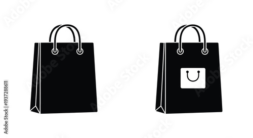 Two black shopping bags with handles one displays a small logo
