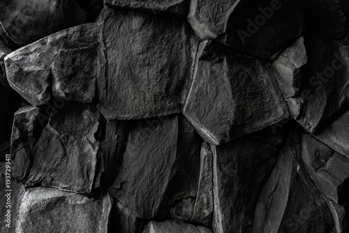 Fényképezés Detailed view of black volcanic basalt rock formations
