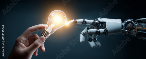 digital technology concept: a human hand touching a digital light bulb and a robot arm with a holographic virtual screen in a futuristic, dark background.