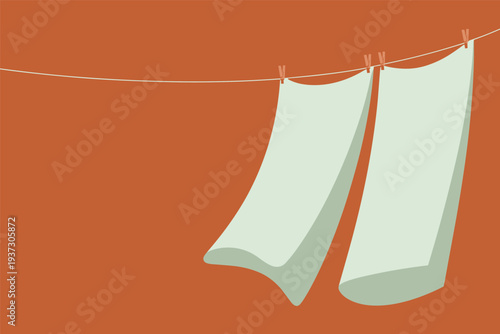 Laundry hanging on a clothesline with clothespins, simple living concept