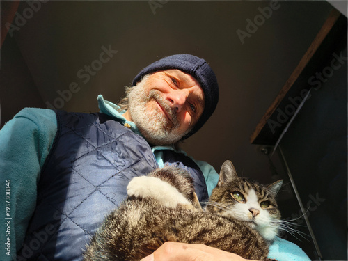 Mature man with a cat