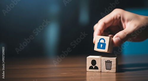 Hand placing lock icon cube above person and trash bin icons security privacy