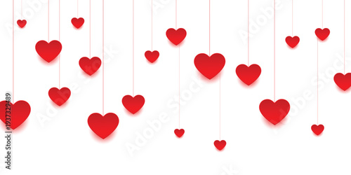 Red hearts hanging from strings on isolated for valentines day