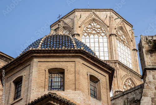 Valencia Cathedral and Royal Basilica of Our Lady of the Forsaken (Real Basílica de Nuestra Señora de los Desamparados) from Plaza de la Virgen, Valencia, Spain. 