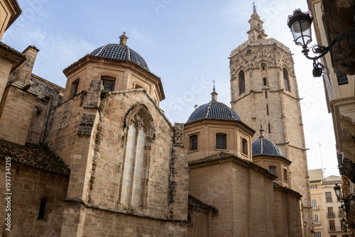Valencia Cathedral and Royal Basilica of Our Lady of the Forsaken (Real Basílica de Nuestra Señora de los Desamparados) from Plaza de la Virgen, Valencia, Spain. 