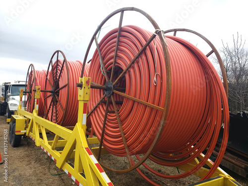 Fiber Optic Cable Reels on Construction Trailer During Internet Infrastructure Installation