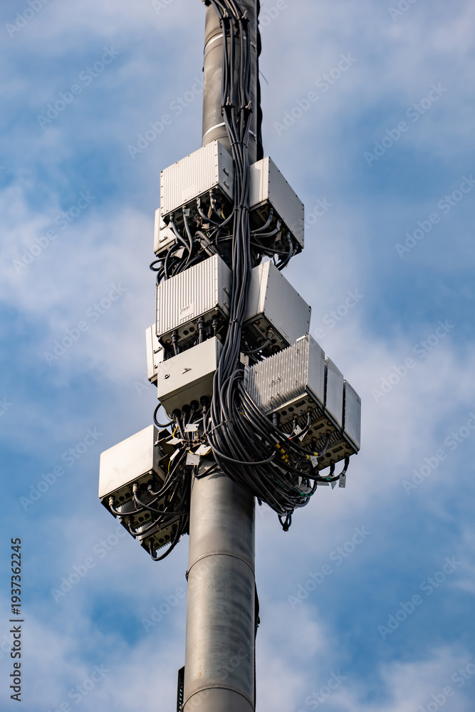 Obraz premium Modern 5G cell tower transmitting wireless data for fast mobile networks