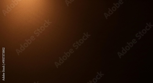 Konstfotografi A warm light spot on a dark brown background with a sense of depth and texture