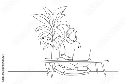 Woman Working Remotely on Laptop with Headphones and Plant