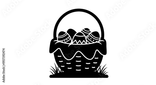 Easter eggs in a traditional wicker basket on grass