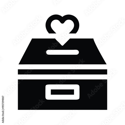 Donation box with heart shaped slot on top for charitable giving and fundraising campaigns  symbolizing generosity and kindness