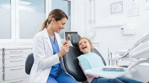 Female dentist examining child sitting in dental clinic chair