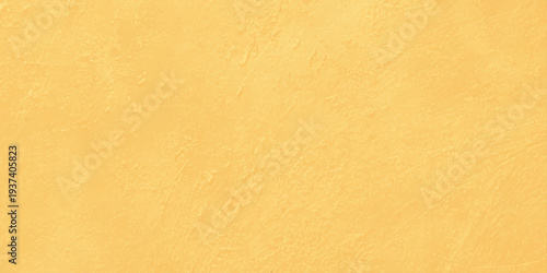 yellow ochre textured wall background with subtle plaster strokes and warm earthy parchment