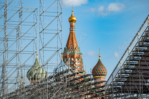 St. Basil's Cathedral domes and spires appearing through extensive metal scaffolding