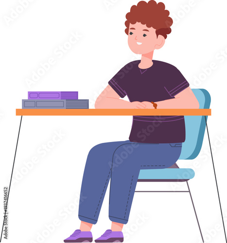 Boy student. Teenager sit at school desk and learning