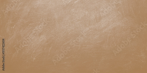A vintage brown aged parchment background with a rough textured kraft paper pattern and blank grunge cardboard surface design for an empty old material backdrop