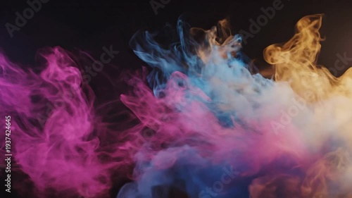 Abstract vibrant plumes of colorful smoke unfurl and swirl against a deep black backdrop