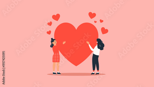 Couple standing together holding a large red heart surrounded by smaller hearts.