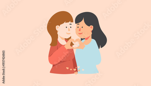 Two women embracing and holding a heart together.