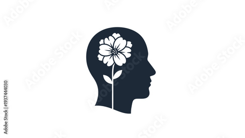 Human Head Silhouette with Flower Inside.