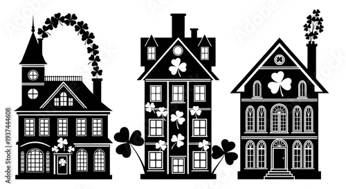 Black and white illustration of three charming houses with shamrocks