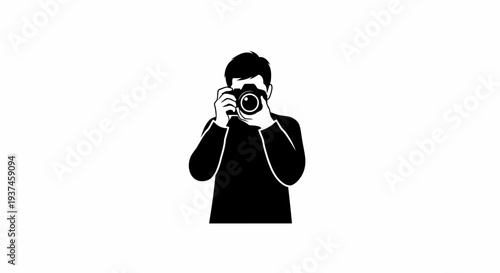 Man holding a camera and photographing.