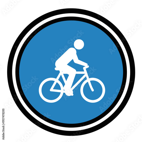 Person riding a bicycle on a designated bike lane or path.