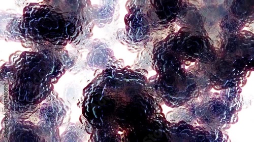 Dynamic abstract motion graphics featuring fluid liquid-like textures flowing across a foggy glass surface with soft blurred floral colors behind it. Dreamy organic movement with vibrant gradients and